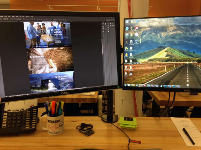 Image of Justin's workspace at Aztek. Current work on screen. Learn about Justin's essential web design tools.