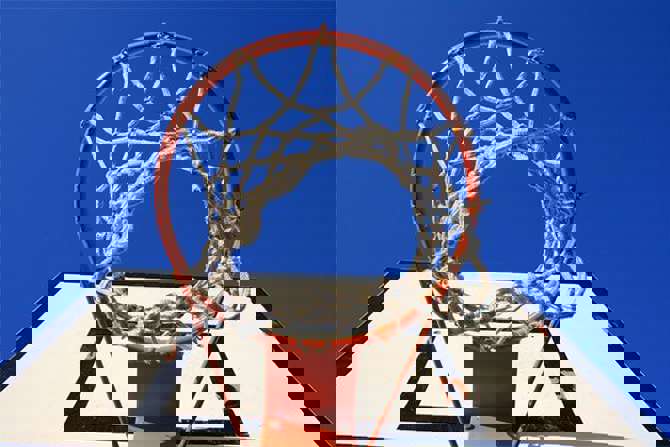 Image of a basketball hoop. Find out more about how basketball can help explain attribution modeling.