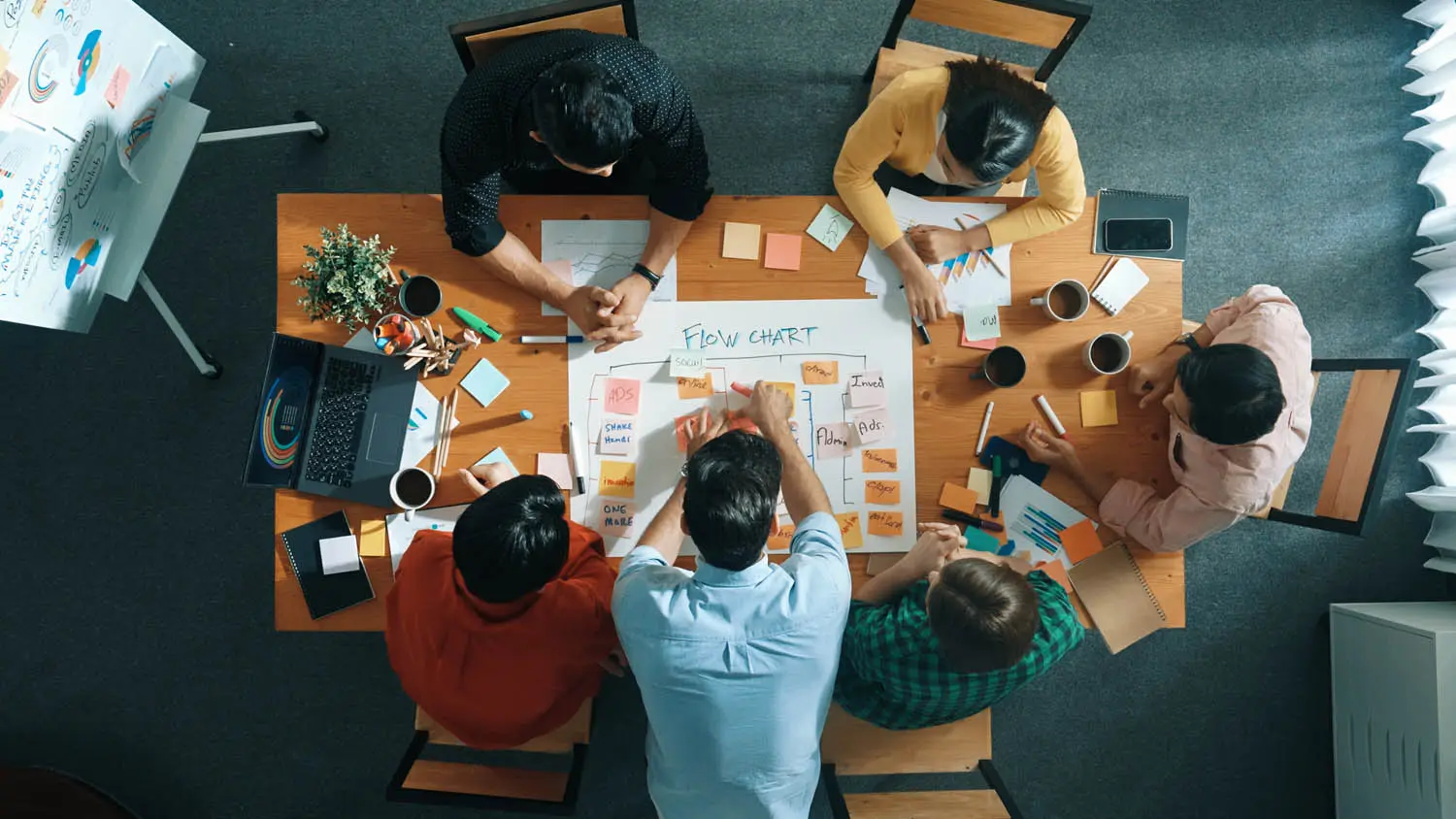 overhead view of group of people meeting