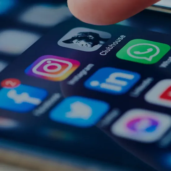 close up of a phone with social media icons
