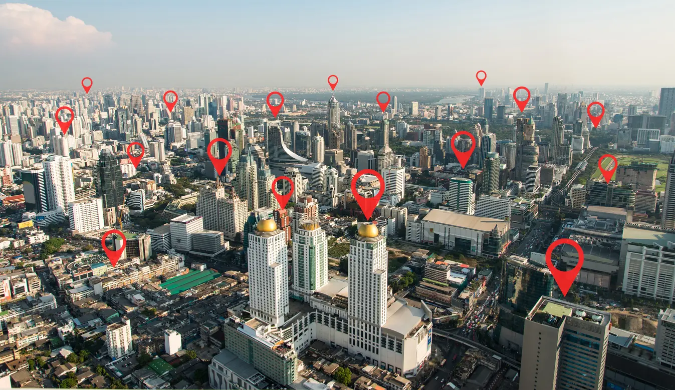 city with location icons over buildings
