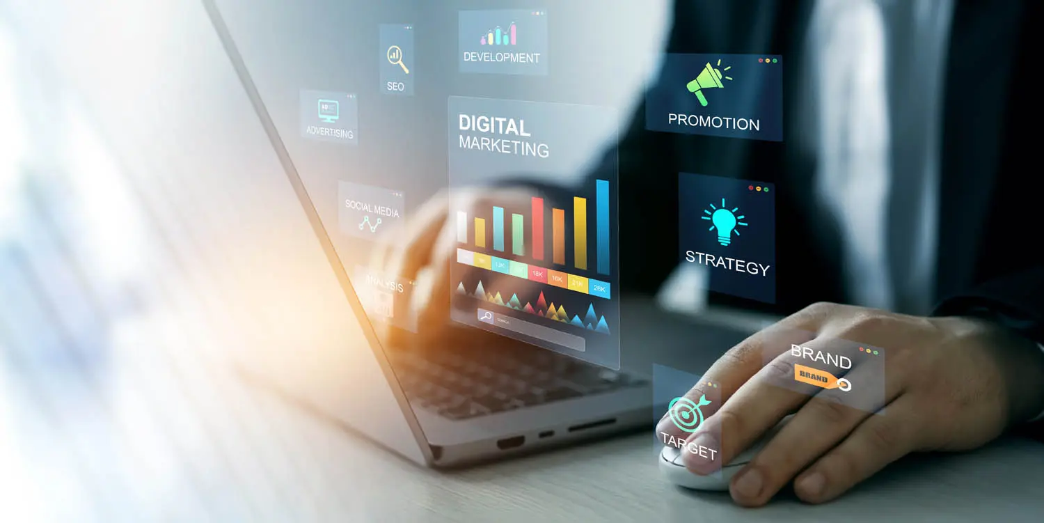 laptop with digital marketing graphics