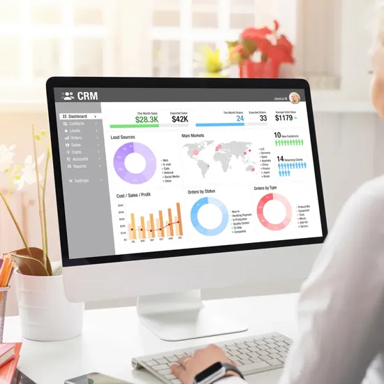 person with CRM info on a computer screen